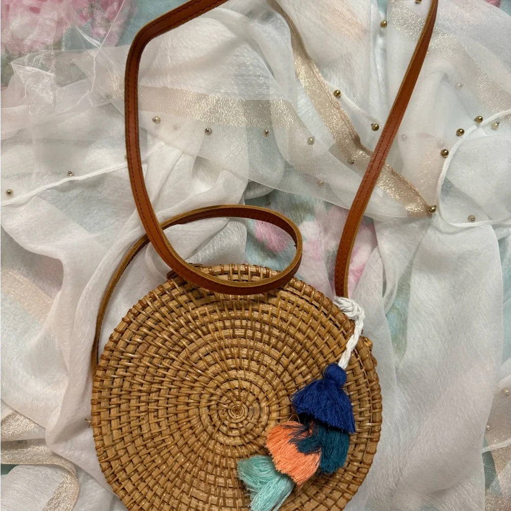 Round Woven Crossbody Bag with Tassels - Picture 1 of 5